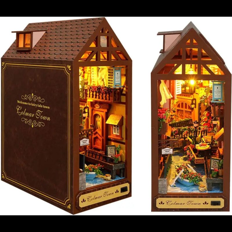 artisan-crafted-bookshelf-scene-of-a-colmar-style-street Artisan-style bookshelf scene recreating a warm Colmar cobblestone street
