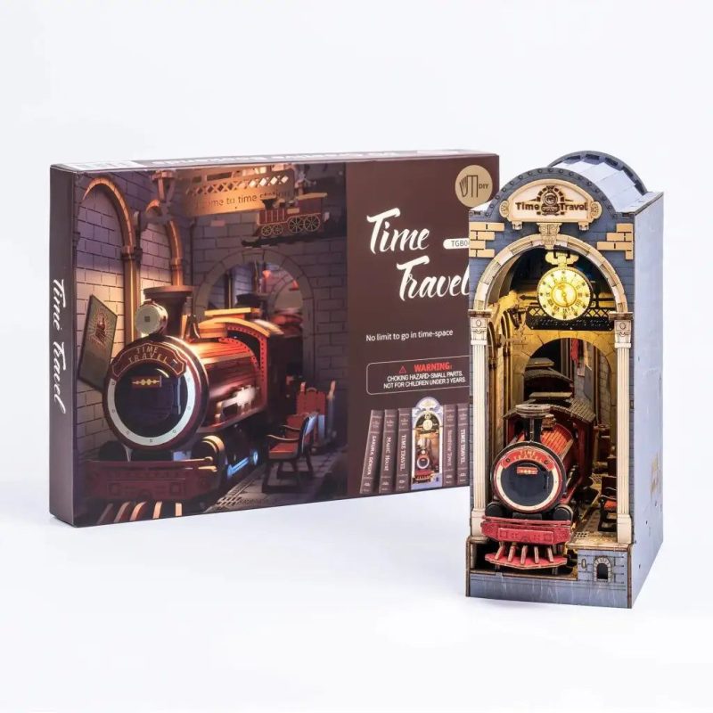 assemble-your-own-book-nook-kit-featuring-a-mysterious-time-machine-carriage Book nook kit build progress showing time machine carriage and tunnel entrance