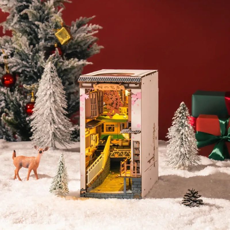 cherry-blossom-bookshelf-diorama-with-miniature-train Cherry blossom bookshelf diorama with miniature Densha train crossing scene