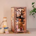 cherry-blossom-bookshelf-insert-with-fairy-lights cherry blossom bookshelf insert with warm fairy lights glowing between books