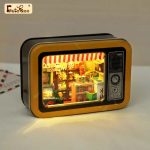 compact-miniature-room-craft-kit Compact LED miniature dollhouse room craft kit measuring 11x4x7.5 cm on display