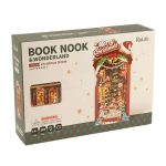 Cozy winter reading nook miniature with warm LED accent lighting and snow details