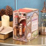 decorative-book-nook-insert-featuring-flowering-ruins Decorative book nook insert featuring flowering stone ruins and lanterns
