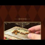 decorative-bookshelf-theater-diorama-for-reading-nook Decorative bookshelf theater diorama for reading nook with warm lighting