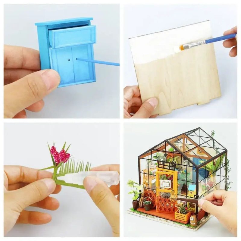 decorative-miniature-greenhouse-with-assembly-pieces Decorative miniature greenhouse with laser-cut assembly pieces laid out before build
