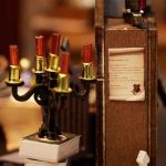 decorative-miniature-home-model-with-tiny-accessories Finished decorative miniature home model with tiny framed pictures and accessory details