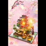 desktop-zen-garden-with-miniature-house-and-bonsai Desktop zen garden miniature house with bonsai accent and warm lighting