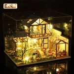 detailed-bamboo-courtyard-miniature-with-traditional-tiles-and-furniture Detailed bamboo courtyard miniature showing traditional roof tiles and wooden furniture