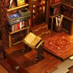 detailed-bookshelf-diorama-collectible-miniature-library Detailed bookshelf diorama close-up of collectible miniature library shelves and spines