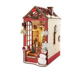 Detailed holiday diorama for book lovers display showing music box mechanism