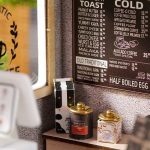 detailed-miniature-coffee-shop-model-for-hobby-and-crafting Detailed miniature coffee shop model showing craftsmanship and finishing