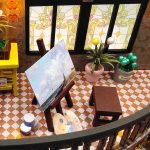 detailed-miniature-cottage-with-realistic-textures Detailed miniature cottage showing wood grain texture and resin accessory relief