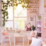 detailed-tiny-house-scenery-and-painting-project Detailed tiny house scenery showing decorative painting and finishing work close-up