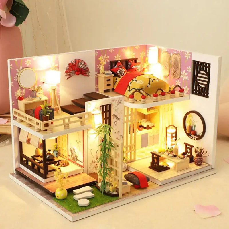 diy-bamboo-tiny-house-model-for-home-decor DIY bamboo tiny house model displayed as home decor on a wooden shelf