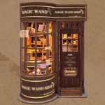 diy-enchanted-wand-shop-bookshelf-insert DIY enchanted wand shop bookshelf insert with opening door detail