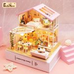 diy-miniature-dessert-shop-dollhouse-accessories DIY miniature bakery kit pieces laid out before assembly: wood walls, accessories, music box components
