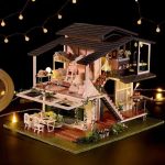 diy-miniature-floral-dollhouse-craft-with-pond DIY miniature floral dollhouse craft kit showing pond and bridge detail