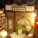 diy-miniature-ink-art-kit-for-scale-model-interiors DIY miniature ink art kit components for scale model study room interior with wooden frame and paper elements
