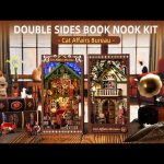 diy-miniature-library-insert-featuring-cats DIY miniature library insert with cats and warm LED glow detail