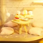 diy-tiny-cat-cafe-model-with-furniture DIY tiny cat café model showing wooden furniture and accessories