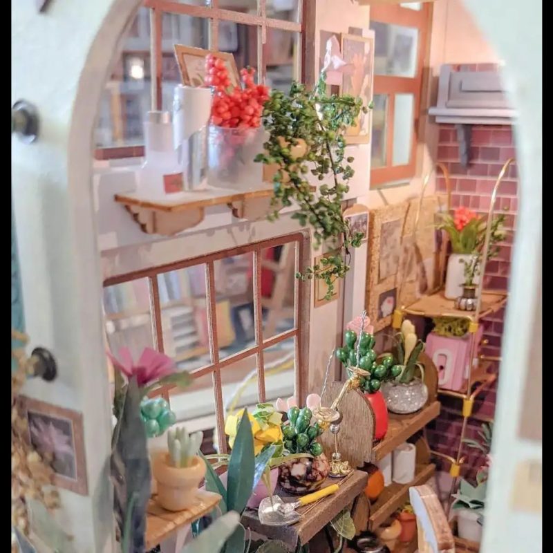 diy-tiny-floral-shop-miniature-assembly-craft DIY tiny floral shop miniature assembly showing laser-cut birch panels and florals