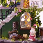 dreamy-miniature-dollhouse-diy-kit-with-celestial-decor Dreamy miniature dollhouse kit showing layered night-sky ceiling detail and celestial decor interior