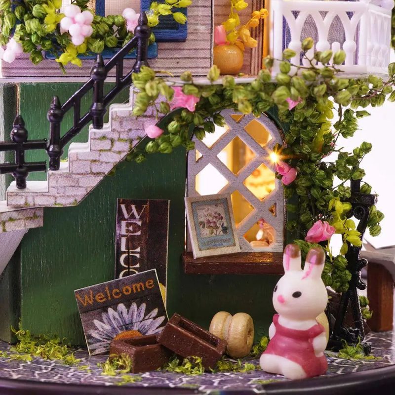 dreamy-miniature-dollhouse-diy-kit-with-celestial-decor Dreamy miniature dollhouse kit showing layered night-sky ceiling detail and celestial decor interior