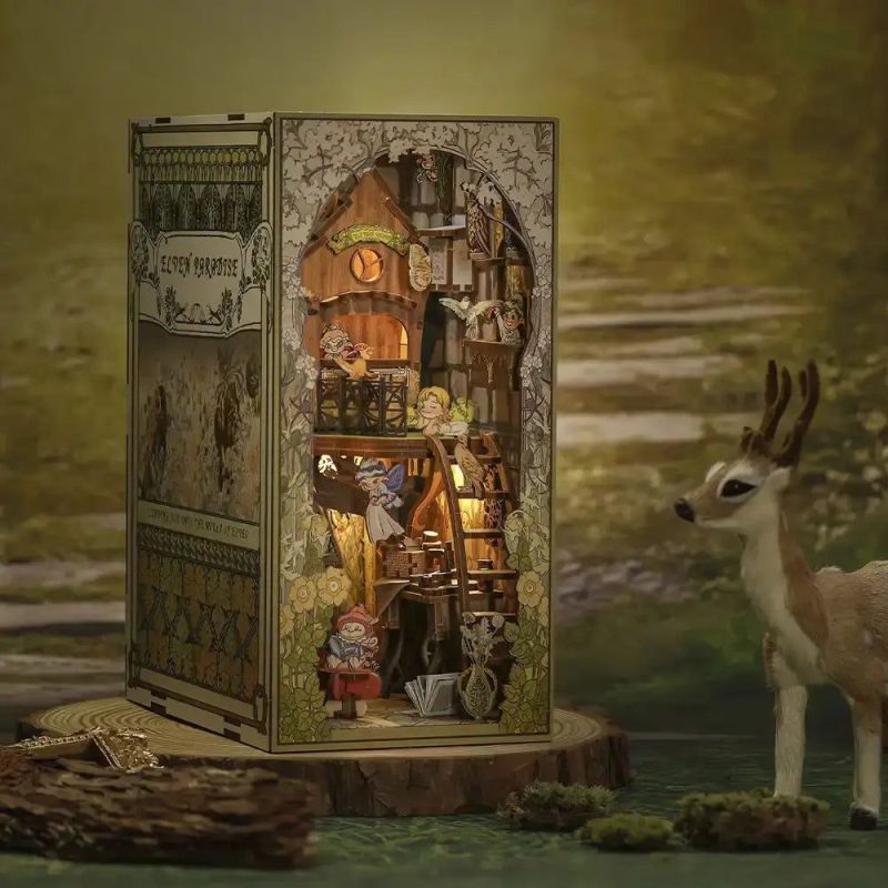 elven-paradise-book-nook-kit Elven Paradise Book Nook Kit assembled on a wooden bookshelf