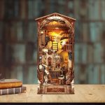 enchanted-miniature-book-nook-for-bookshelf Enchanted miniature book nook glowing between hardcover novels