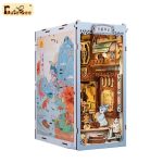 Fairy tale book nook with azure phoenix centerpiece displayed between hardcover books