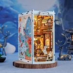 Fantasy bird of fire lodge miniature bookshelf insert showing basswood grain detail