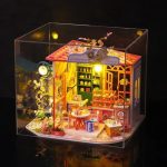 Flower themed build your own tiny house kit showing finished assembly example