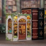 handcrafted book nook with indoor plant and foliage accents