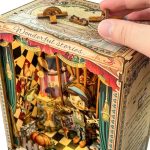 handcrafted-book-nook-with-tiny-puppet-stage-scene Handcrafted book nook with tiny puppet stage scene and movable figurines