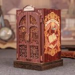 handcrafted-bookshelf-diorama-for-reading-corner-decor Handcrafted bookshelf diorama for reading corner decor with hand-carved details