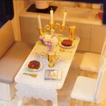 handcrafted-miniature-apartment-model-with-detailed-vintage-decor Handcrafted Time Apartment miniature model with vintage wooden surfaces and brass hardware accents