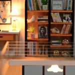 handcrafted-miniature-dollhouse-interior-with-ornate-decor Handcrafted miniature dollhouse interior showing ornate decor and LED glow