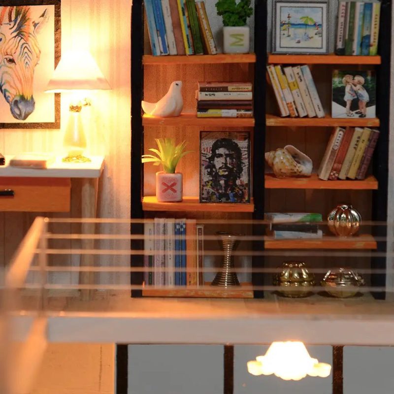 handcrafted-miniature-dollhouse-interior-with-ornate-decor Handcrafted miniature dollhouse interior showing ornate decor and LED glow