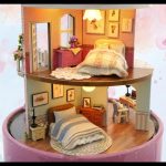 handcrafted-miniature-meeting-scene-for-dollhouse Handcrafted miniature meeting scene with two chairs and ambient glow