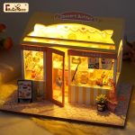 handcrafted-miniature-shop-model-for-collectors Handcrafted miniature shop display: finished kit on home shelf with natural wood finish