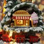 Handcrafted snowy miniature cottage craft kit with wood and flock details