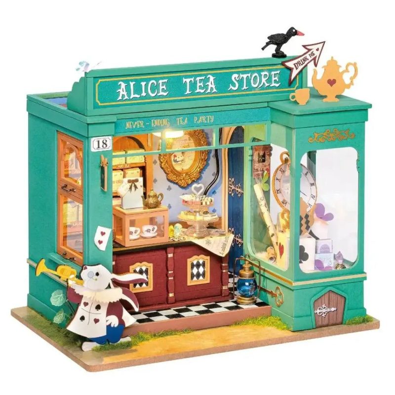 handcrafted-tiny-tea-shop-miniature-house-for-hobbyists Handcrafted tiny tea shop miniature house completed display showing warm LED lighting, paint detail on wood frame, and styled interior