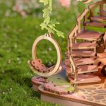 Handcrafted wooden cherry blossom house assembly step detail