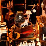 haunted-family-diorama-for-bookcase-display Haunted family diorama for bookcase display with candlelit atmosphere and mysterious furnishings