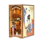illuminated-miniature-bookshelf-scene-with-sakura illuminated miniature bookshelf scene with sakura petals and LED lantern lit