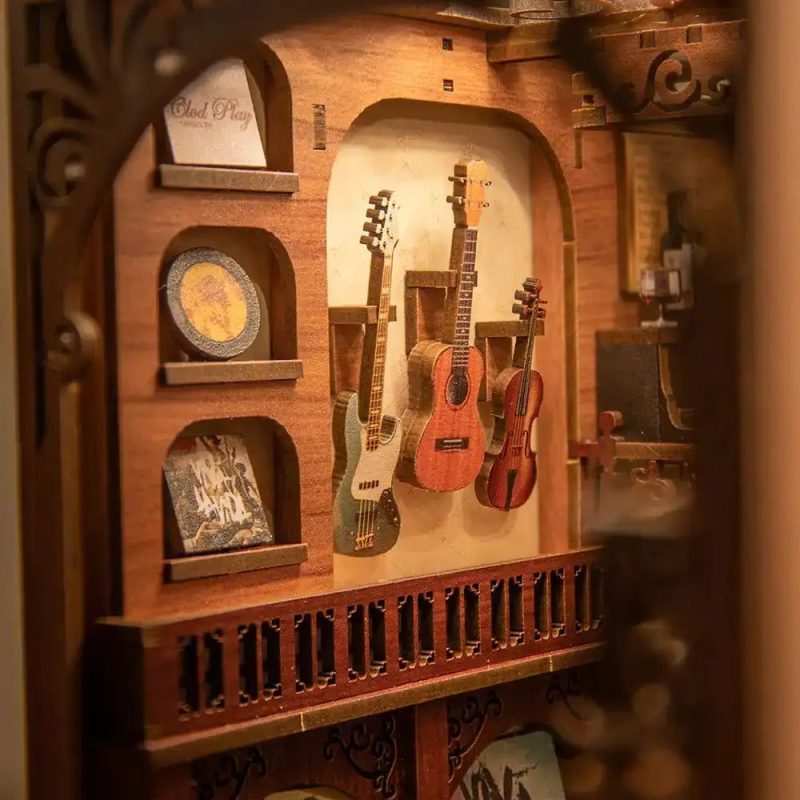illuminated-miniature-reading-nook-with-rhythm-theme illuminated miniature music room book nook with warm amber LED glow