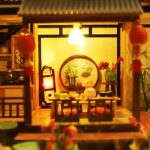 Handcrafted Japanese miniature house model showing detailed interior rooms and traditional architecture