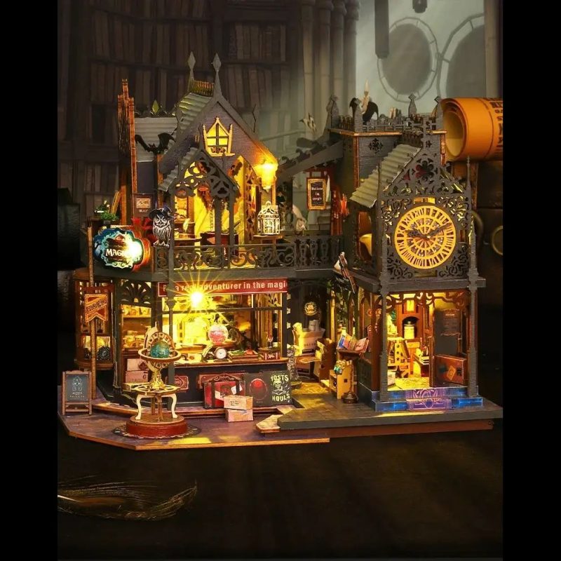 led-illuminated-clock-tower-miniature LED illuminated clock tower miniature with warm amber window glow at night