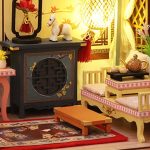 miniature-ancient-book-transformed-into-tiny-house-model Miniature ancient book opened to reveal tiny furnished scholar's study inside