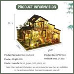 miniature-bamboo-courtyard-dollhouse-scene Assembled miniature bamboo courtyard dollhouse with stone paths and pavilion